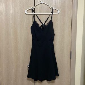Lush brand black skater dress with open/lace back.